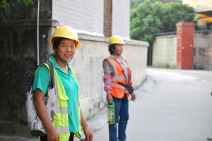 Two Malaysian construction workers